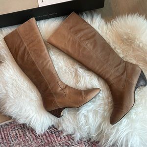 Knee-high low-heel taupe leather boots. Minor wear, comes with box.